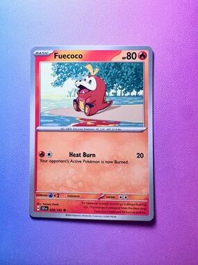 fuecoco - 029/191 (common) — pokémon: surging sparks